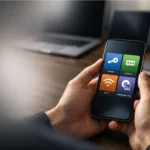 Hands holding a phone with a password manager open