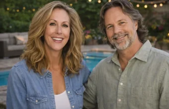Chris Potoski sitting beside a woman in an indoor portrait setting