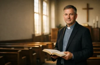 Pastor standing inside a quiet church